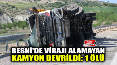 Besni-Adıyaman karayolu çıkışında viraja girerken sürücüsünün kontrolünden çıkan kum yüklü