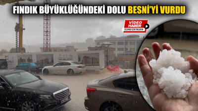 Besni'de aniden bastıran fındık büyüklüğündeki dolu yağışı, ilçeyi kısa sürede
