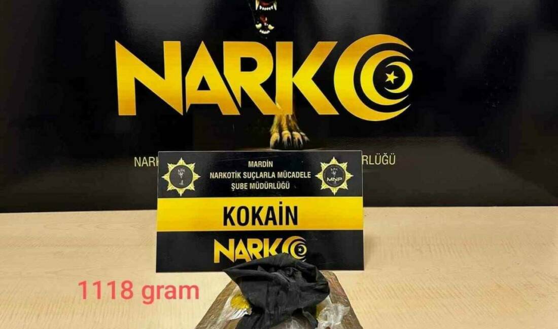 Mardin'de polis ekipleri tarafından bir araçta yapılan aramada 1 kilo
