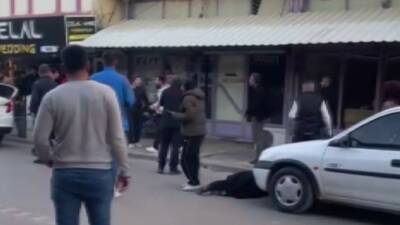 Kahta ilçesinde bir adamın boşanmakta olduğu eşini kızının gözleri önünde