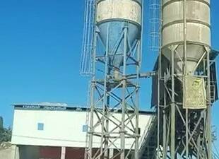 Adıyaman’da, bir işçi parasını alamadığını iddia ederek çimento silosunun üzerine