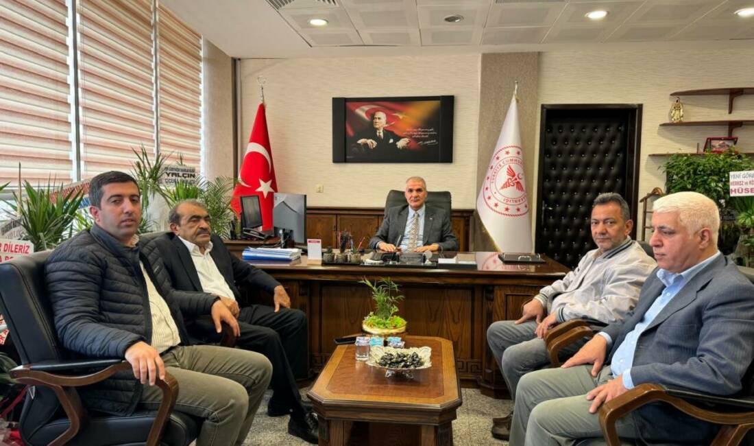 Adıyaman Gazeteciler Cemiyeti Başkanı Zeki Dişkaya ve yönetim kurulu üyeleri,