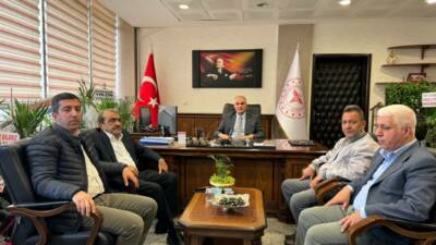 Adıyaman Gazeteciler Cemiyeti Başkanı Zeki Dişkaya ve yönetim kurulu üyeleri,