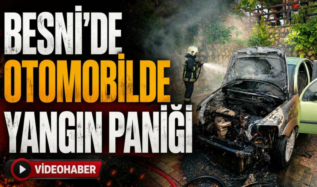 Besni’de bir apartmanın avlusunda park halindeki otomobilin motor bölümünde çıkan