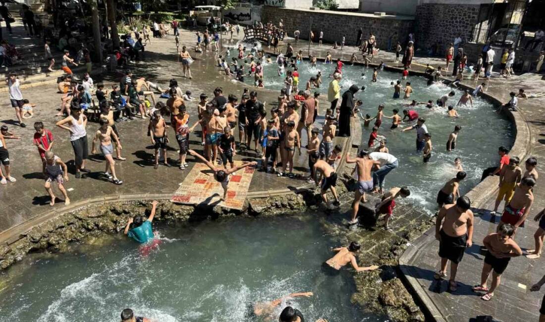 Diyarbakır’da hava sıcaklıkları 37 dereceyi gösterirken, çocuklar serinlemek için Anzele