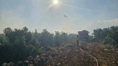 Gaziantep’in Nurdağı ilçesinde çıkan orman yangını, havadan ve karadan yapılan